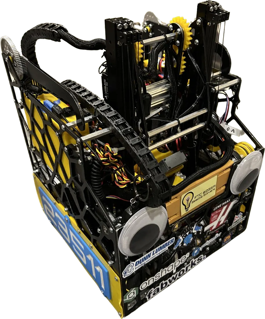 Riptide v2: black spray-painted Voronoi side plates, a blue 23511 plate, googly eyes on the front and sponsor stickers across the bumper
